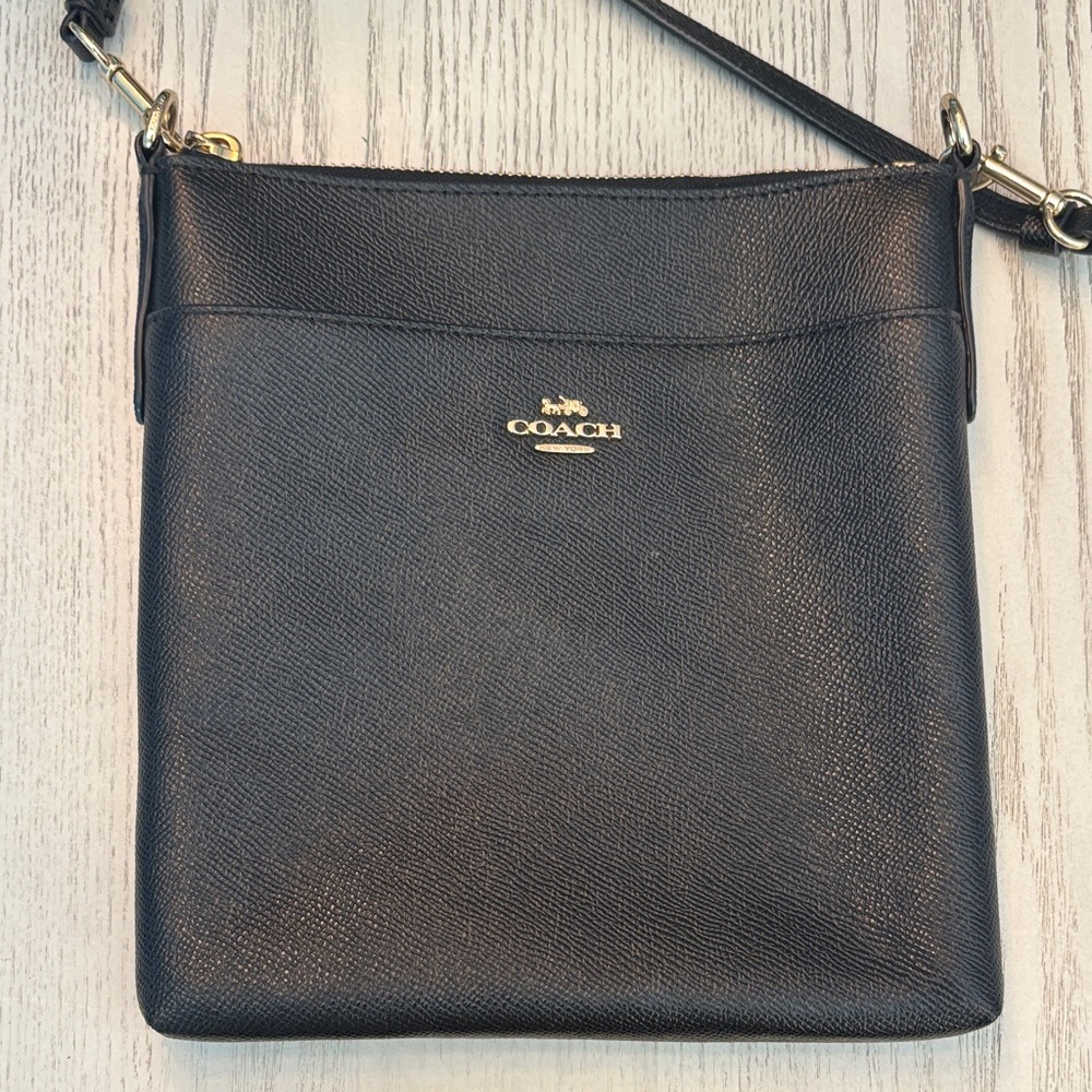 Coach Black Leather Shoulder Bag with Gold Details